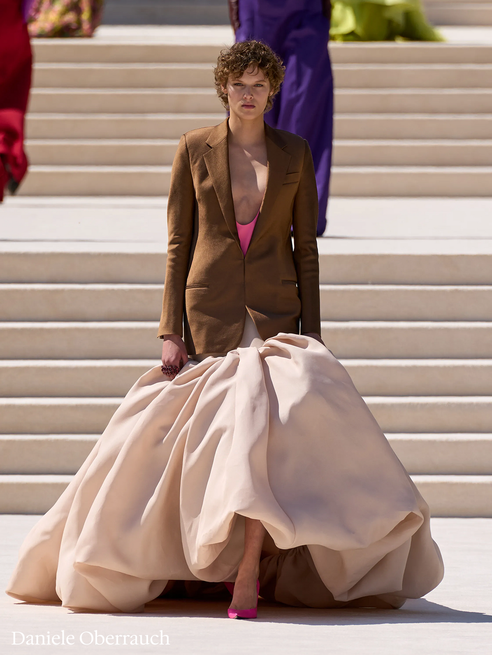 Fashion keeps asking for a new direction and never waits for it to land.