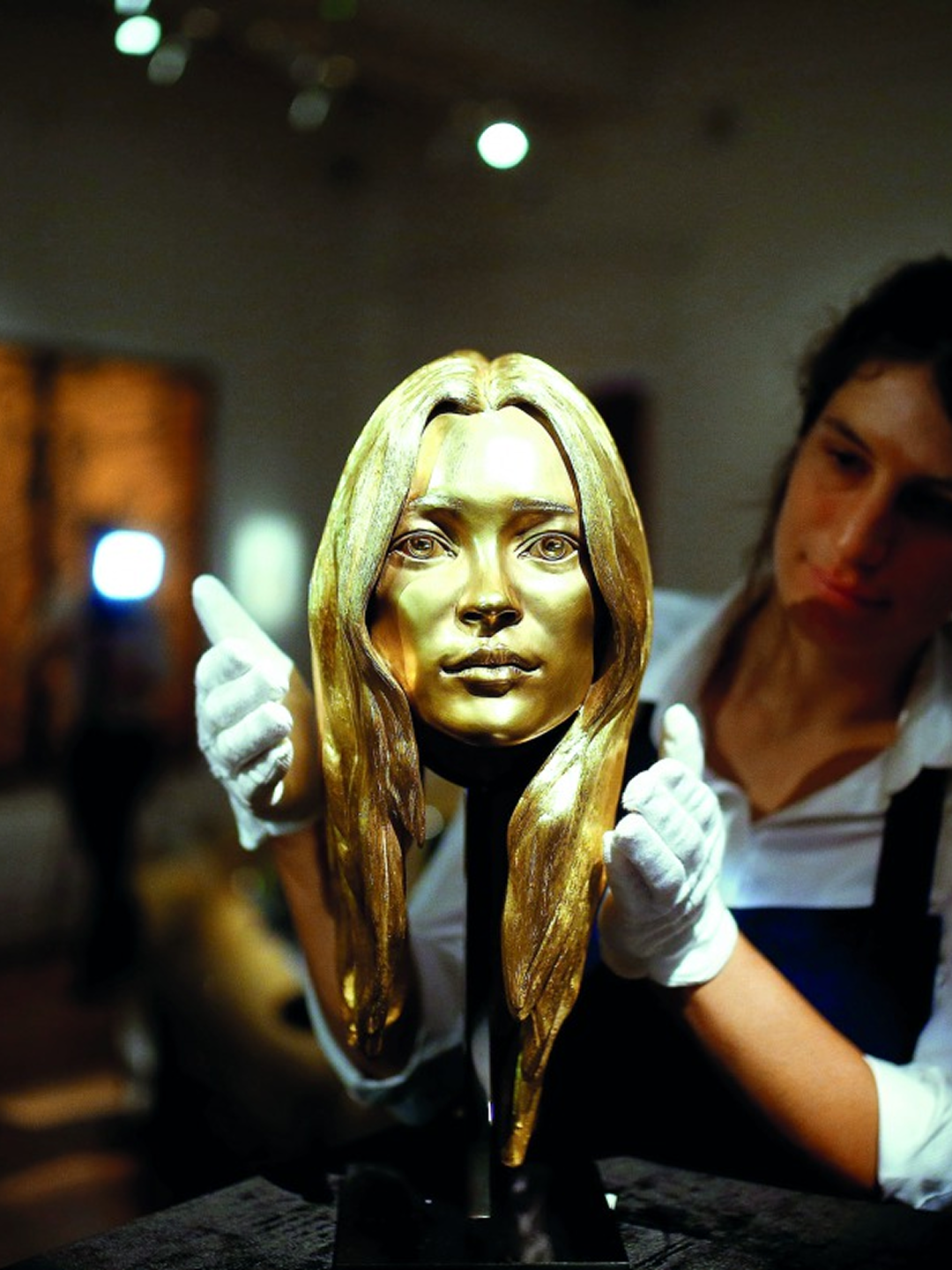 A Golden Kate Moss Head Once Sat on Display at Sotheby's London